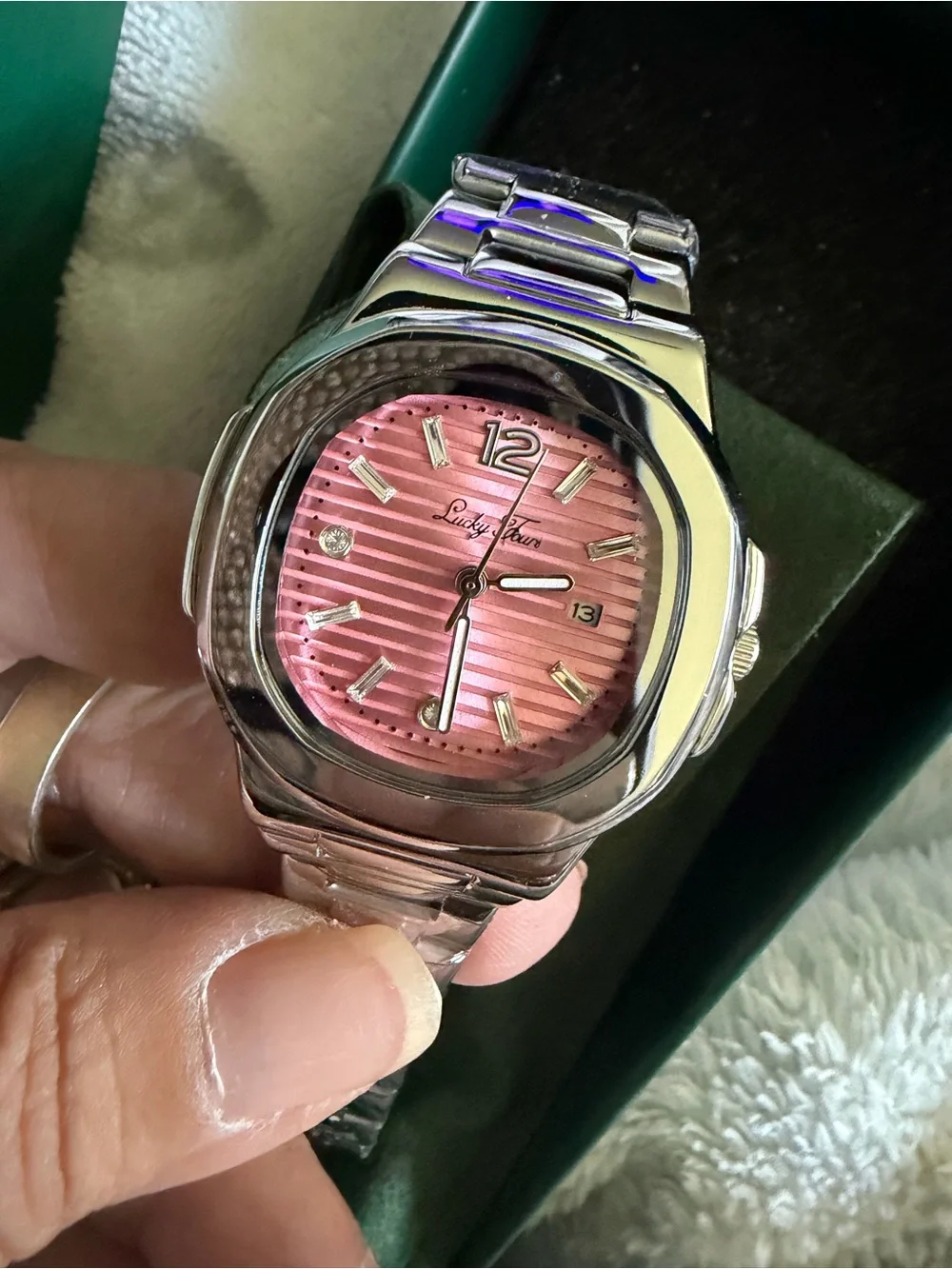 Lucky Four stainless steel watch with pink face and crystal